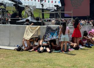 Lollapalooza 2026: fãs enfrentam calor, filas, espera e busca por lugar na sombra no 1º dia de festival